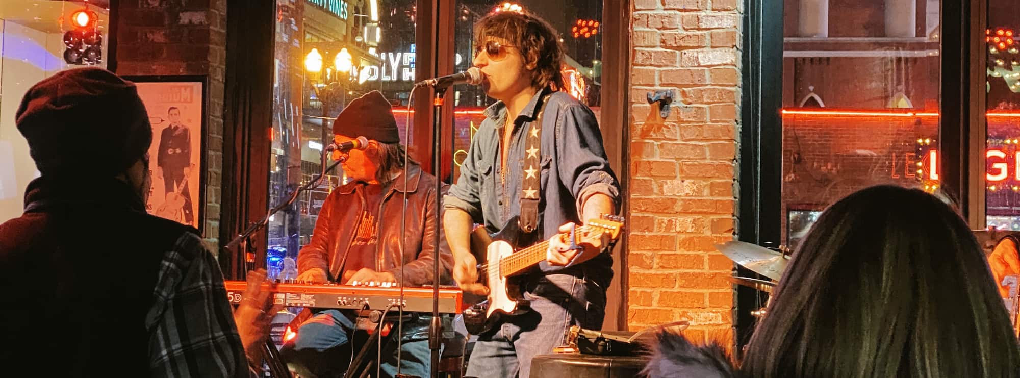 bar singer on guitar in Baton Rouge