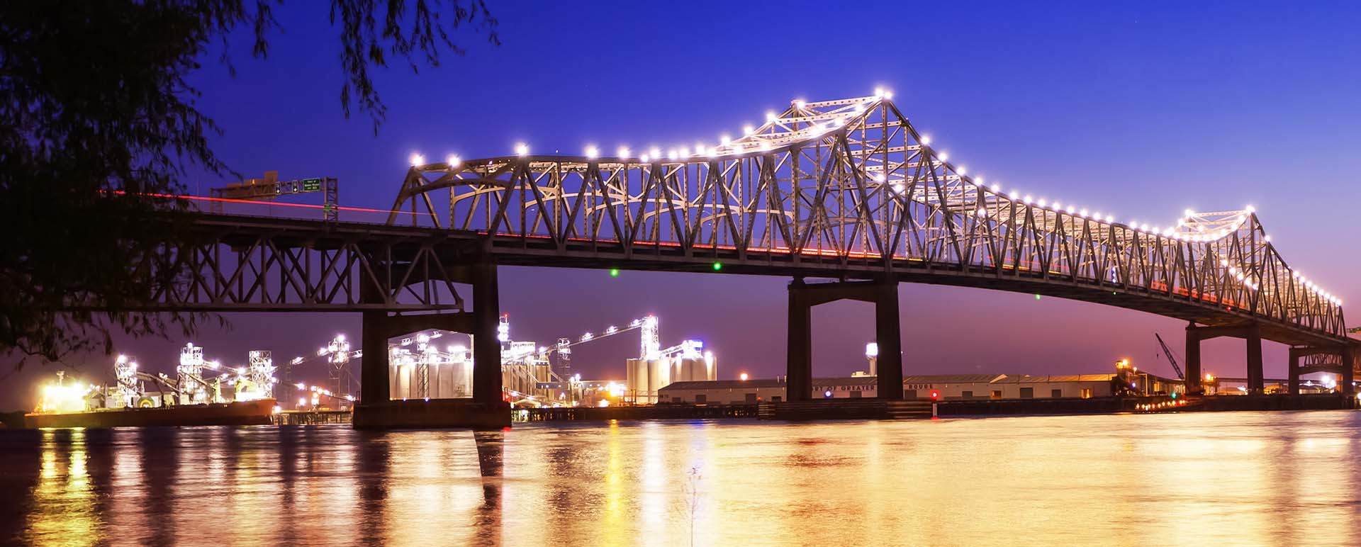 Neon color image of a band playing and people singing along